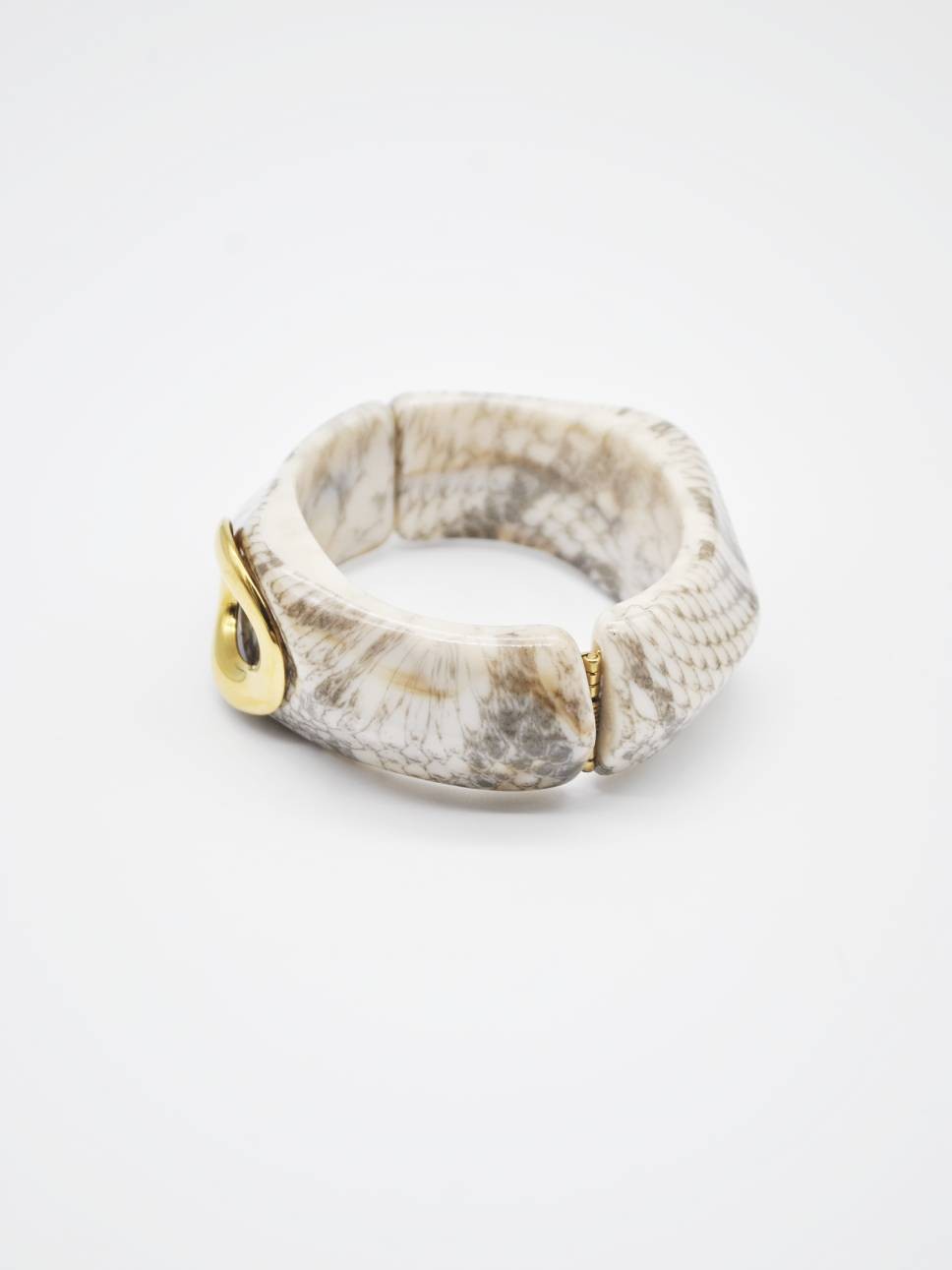 PULSEIRA RÍGIDA COM EFEITO PELE DE COBRA PULSEIRA RÍGIDA COM EFEITO PELE DE COBRA